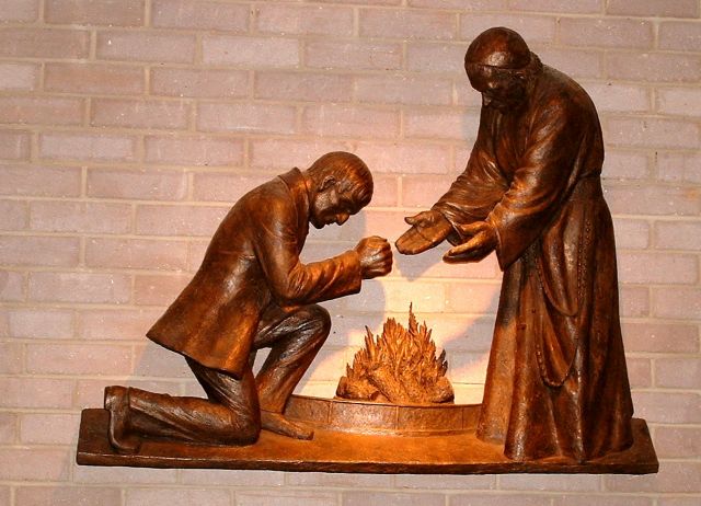 Bronze relief at St. Dominic Barberi’s Church in Littlemore. John Henry Newman is received into the Catholic Church, October 9, 1845 by the Italian Passionist Dominic Barberi.